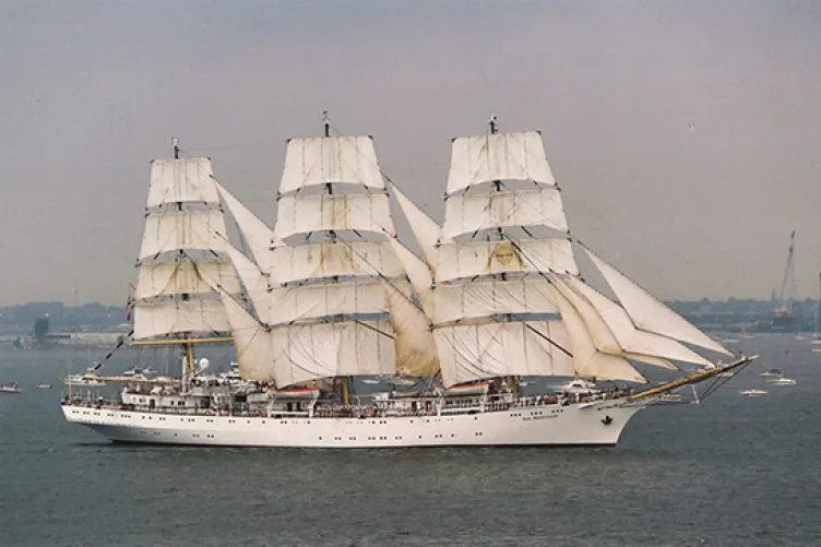 A sailboat on the water during OpSail 2000