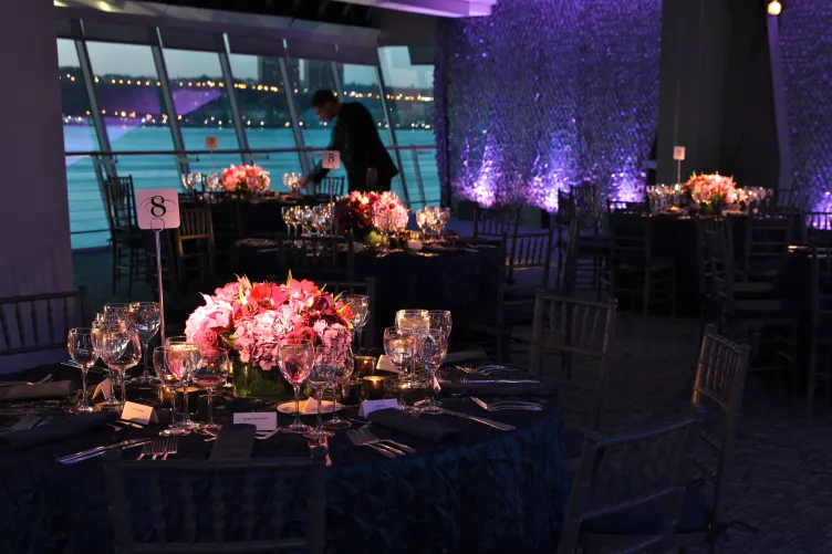 Tables set up for a reception in the Great Hall