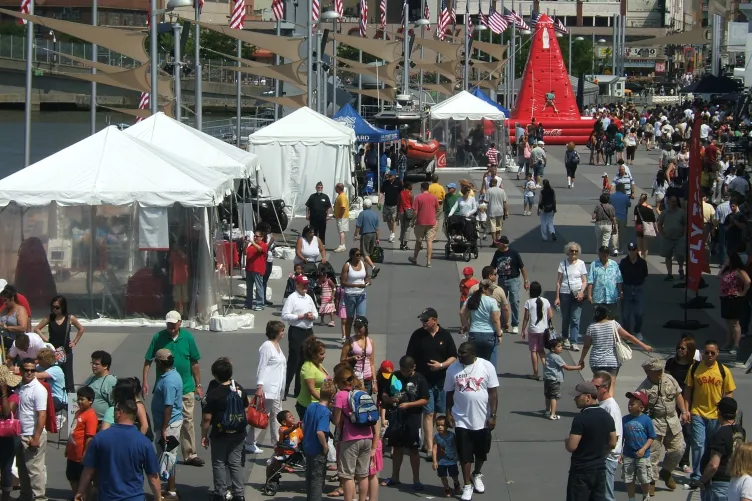 Tents and tables set up on the pier for Fleet Week