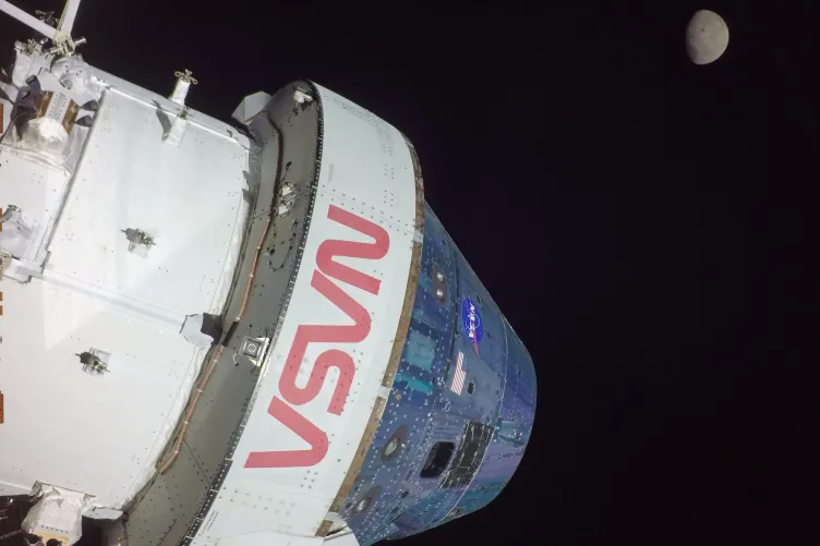 The Orion spacecraft with the Moon beyond