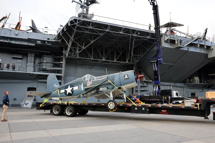 Corsair aircraft positioned on a track at Pier 86, Intrepid Museum