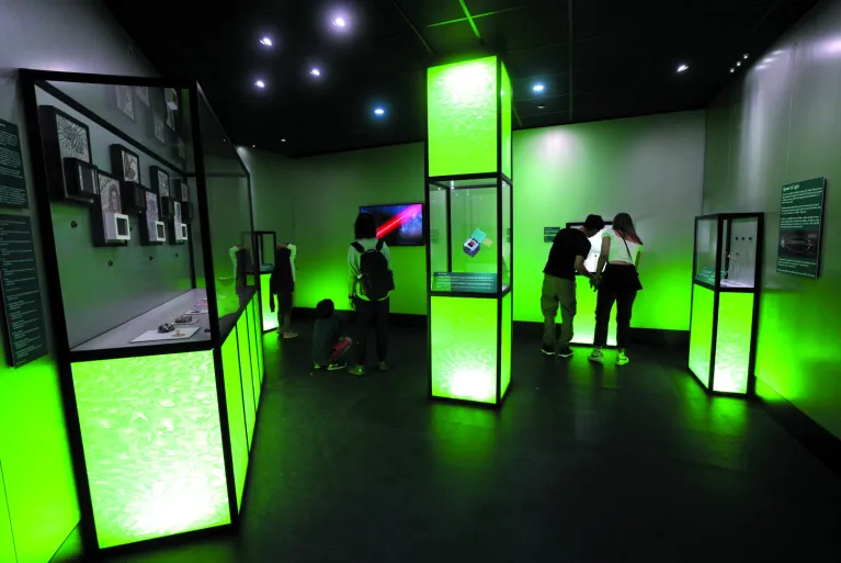 Visitors explore exhibition in the Space Shuttle Pavilion.