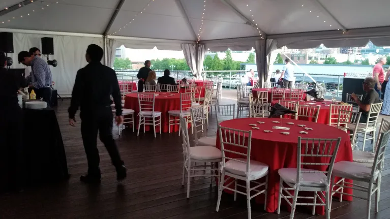 Starboard Aircraft Elevator Tent setup for a sit down breakfast.