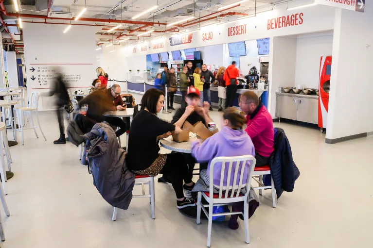 Museum visitors are eating in the Aviator Grill.