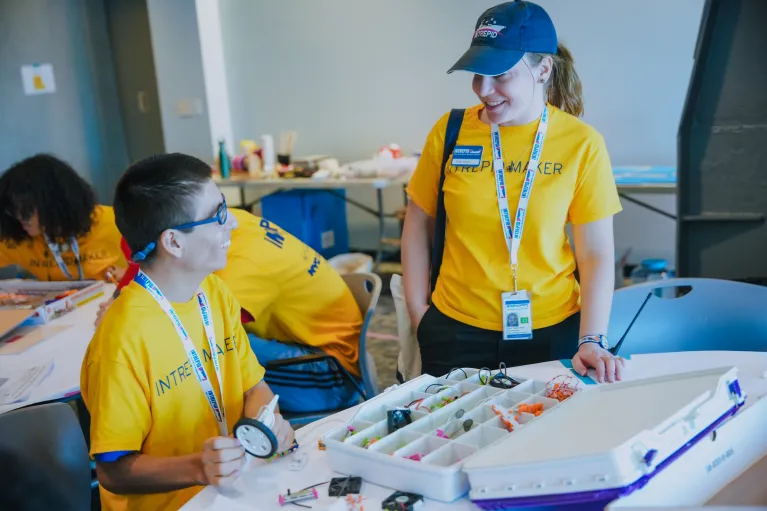 camp counsellor doing activities with campers at the intrepid museums all access maker camp