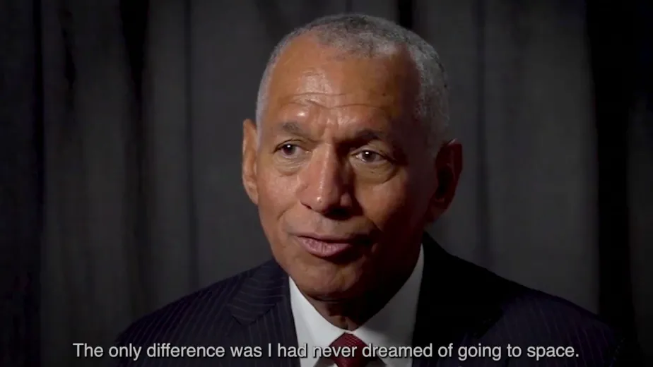 Charles Bolden, former NASA Administrator, wearing a suit and tie